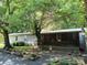 Charming single story home with a welcoming porch and well-maintained landscaping at 189 6Th Ave, New London, NC 28127
