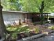 Charming home featuring a lovely screened-in porch and landscaped front yard at 189 6Th Ave, New London, NC 28127