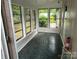 Bright sunroom featuring large windows that offer ample natural light and green outdoor views at 189 6Th Ave, New London, NC 28127