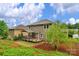 Spacious backyard includes a deck area, colorful landscaping, and scenic views at 1919 Madeira Cir, Waxhaw, NC 28173