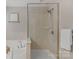 Bathroom with shower featuring glass door and tile surround at 1919 Madeira Cir, Waxhaw, NC 28173