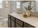Bathroom vanity features solid surface countertop, undermount sink, and decorative accents at 1919 Madeira Cir, Waxhaw, NC 28173