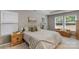 Bright bedroom with multiple windows, neutral walls, and a comfortable king-sized bed at 1919 Madeira Cir, Waxhaw, NC 28173