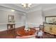 Dining room features hardwood floors, chair rail molding, and classic furnishings at 1919 Madeira Cir, Waxhaw, NC 28173
