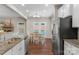 Bright eat-in kitchen offers granite countertops and stainless steel appliances at 1919 Madeira Cir, Waxhaw, NC 28173