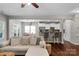 Open floor plan view showcasing a living room and kitchen with bar seating at 1919 Madeira Cir, Waxhaw, NC 28173
