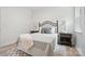 Stylized bedroom showing decorative metal bed frame, textured rug, and cozy, decorative accents at 195 Linda St, Salisbury, NC 28146