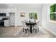 Bright dining room with sliding door and a round table at 195 Linda St, Salisbury, NC 28146