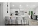 Modern kitchen with white cabinets, stylish seating at the island, and stainless steel appliances at 195 Linda St, Salisbury, NC 28146