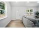 Sun-filled living room featuring a large window and a comfortable seating arrangement at 195 Linda St, Salisbury, NC 28146