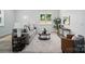 Bright living room with wood-look flooring, contemporary furnishings, and large picture window at 195 Linda St, Salisbury, NC 28146