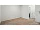Empty bedroom with neutral carpeting is ready to be personalized with your own decor at 2018 Crooked Oak Ln, York, SC 29745