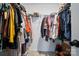 A walk-in closet is equipped with shelving and hanging rods providing ample storage space at 2018 Crooked Oak Ln, York, SC 29745