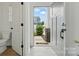 Light and bright entryway showing the front door and a view to the outside at 2018 Crooked Oak Ln, York, SC 29745