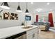 Open kitchen layout with island seating and a view to the adjacent living space at 2018 Crooked Oak Ln, York, SC 29745