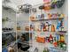 Well-organized pantry with ample shelving for food storage and kitchen essentials at 2018 Crooked Oak Ln, York, SC 29745