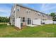 Home with a backyard featuring a well-maintained lawn and privacy fence at 2021 Vinyasa Ln # Sts-41, Charlotte, NC 28215