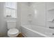 Bright bathroom featuring a shower-tub combination with a window providing natural light at 2021 Vinyasa Ln # Sts-41, Charlotte, NC 28215