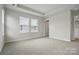 Inviting bedroom with bright natural light and a connecting door to an adjoining room at 2021 Vinyasa Ln # Sts-41, Charlotte, NC 28215