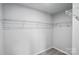 Spacious walk-in closet featuring wire shelving and neutral paint at 2021 Vinyasa Ln # Sts-41, Charlotte, NC 28215