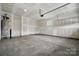 An unfinished garage offers a blank canvas for your storage and parking needs at 2021 Vinyasa Ln # Sts-41, Charlotte, NC 28215
