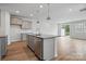 Well-equipped kitchen features stainless steel appliances, a granite countertop island, and ample storage at 2021 Vinyasa Ln # Sts-41, Charlotte, NC 28215