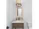 Charming powder room with a rustic vanity, granite countertop, and modern fixtures at 2026 Thatcher Way, Fort Mill, SC 29715