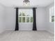 Bright bedroom featuring carpet, shutters and a modern light fixture at 2026 Thatcher Way, Fort Mill, SC 29715