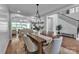 Elegant dining room featuring a large table, stylish chairs, and seamless access to the living area at 2026 Thatcher Way, Fort Mill, SC 29715