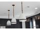 Kitchen pendant lighting with rope and white glass shades over dark cabinets at 2026 Thatcher Way, Fort Mill, SC 29715