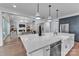 Beautiful kitchen featuring marble countertops, stainless steel appliances, and elegant pendant lighting at 2026 Thatcher Way, Fort Mill, SC 29715