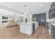 Open layout with an island and lots of space, seamlessly connected to the living area and the kitchen at 2026 Thatcher Way, Fort Mill, SC 29715