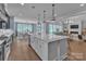 Bright and airy kitchen featuring a large center island, modern appliances, and an open floor plan at 2026 Thatcher Way, Fort Mill, SC 29715