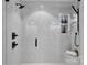 Modern shower featuring white tile, glass door, and sleek shower fixtures at 2026 Thatcher Way, Fort Mill, SC 29715