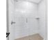 Modern walk-in shower with subway tile, glass enclosure, and neutral tile floor at 2026 Thatcher Way, Fort Mill, SC 29715