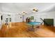 The basement has wood floors, a pool table, and workout equipment at 220 Glenville Dr, Fort Mill, SC 29715