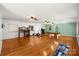 This is a large basement with wood floors, workout equipment, and a pool table at 220 Glenville Dr, Fort Mill, SC 29715