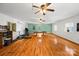 Spacious basement features wood floors, a pool table, and workout equipment at 220 Glenville Dr, Fort Mill, SC 29715