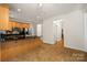 Open kitchen with granite countertops, stainless steel appliances and tile flooring at 220 Glenville Dr, Fort Mill, SC 29715