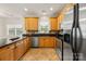 Kitchen with stainless steel appliances and granite countertops at 220 Glenville Dr, Fort Mill, SC 29715