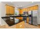 Kitchen features stainless steel appliances, granite countertops and ample cabinet space at 220 Glenville Dr, Fort Mill, SC 29715