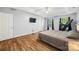 Spacious main bedroom boasts wood floors, a tray ceiling and great natural light at 220 Glenville Dr, Fort Mill, SC 29715
