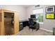 Well-equipped office space featuring a sauna, computer setup, and organized work area at 2638 Park Rd # H, Charlotte, NC 28209