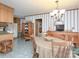 Cozy dining area featuring a vintage hutch and an adjacent kitchen area at 269 Johnson Dairy Rd, Mooresville, NC 28115