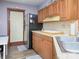 Functional kitchen featuring stainless steel appliances, wooden cabinets, and a bright, tiled backsplash at 269 Johnson Dairy Rd, Mooresville, NC 28115
