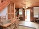 Charming living room with wood paneling, hardwood floors, featuring a unique blend of rustic charm at 269 Johnson Dairy Rd, Mooresville, NC 28115