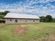 Durable building structure with a metal roof situated on a verdant grassy field and blue sky at 269 Johnson Dairy Rd, Mooresville, NC 28115