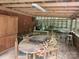 Spacious screened-in outdoor room for dining and entertaining, offering a rustic and open-air experience at 269 Johnson Dairy Rd, Mooresville, NC 28115