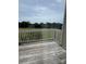 Back deck with railing shows a golf course at 303 Eastwood Dr, Salisbury, NC 28146