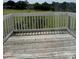 Back deck with railing shows a beautiful view at 303 Eastwood Dr, Salisbury, NC 28146